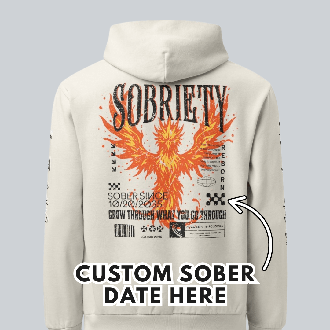 Cream Phoenix Reborn Recovery Hoodie ULTRA Premium Garment Dyed Recovery Hoodie flat lay styled image (view 3)