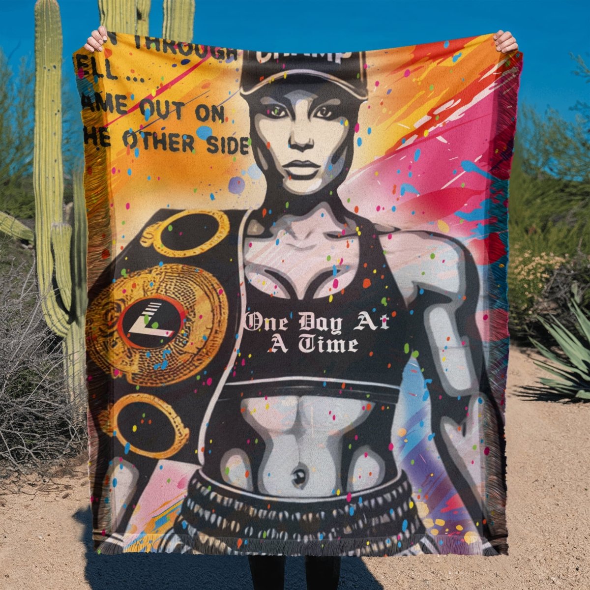 Sober Champ Woman Printed Woven Recovery Blanket flat lay styled image (view 3)