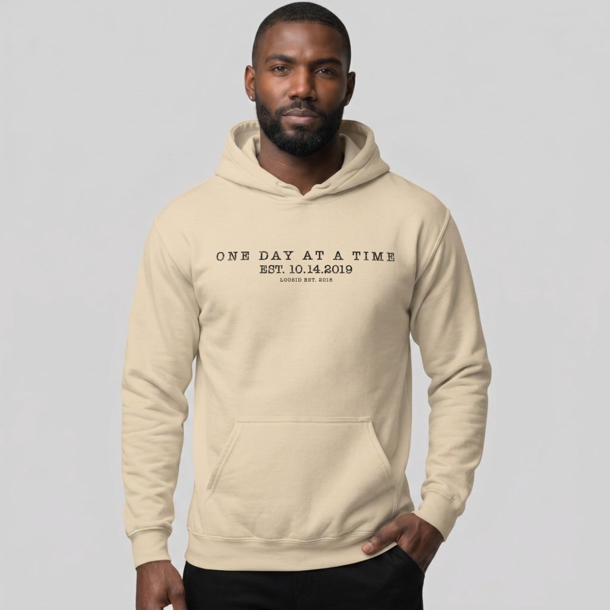 One Day At a Time Recovery Hoodie flat lay styled image (view 13)