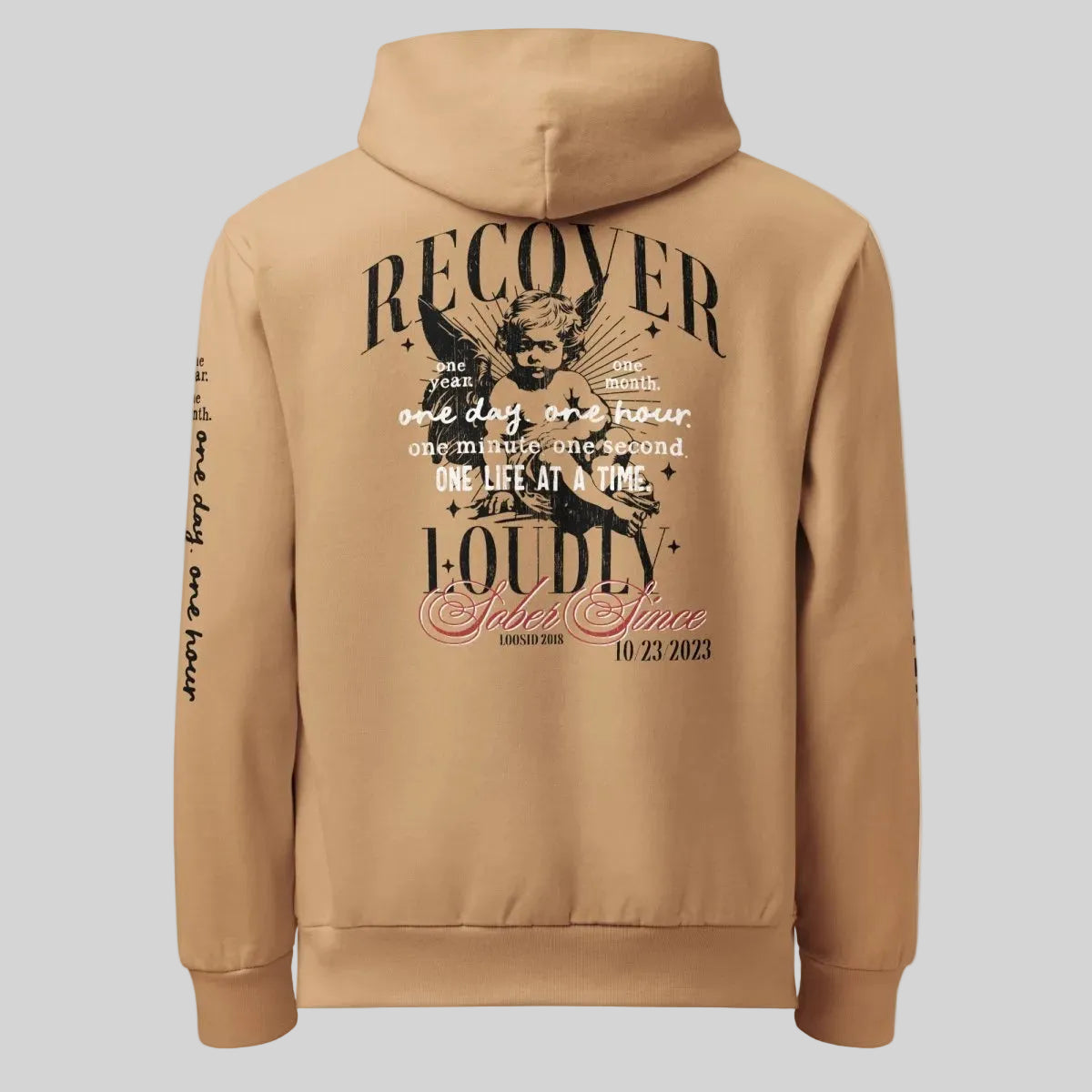 Recover Loudly Tan Recovery Hoodie Limited Edition Recovery Hoodie flat lay styled image (view 3)
