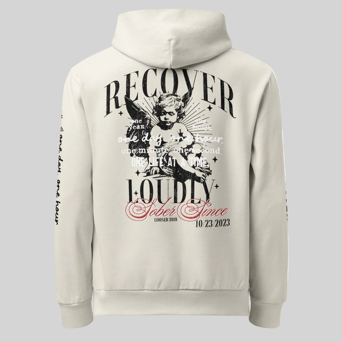 Cream Recover Loudly Hoodie ULTRA Premium Garment Dyed Recovery Hoodie flat lay styled image (view 3)