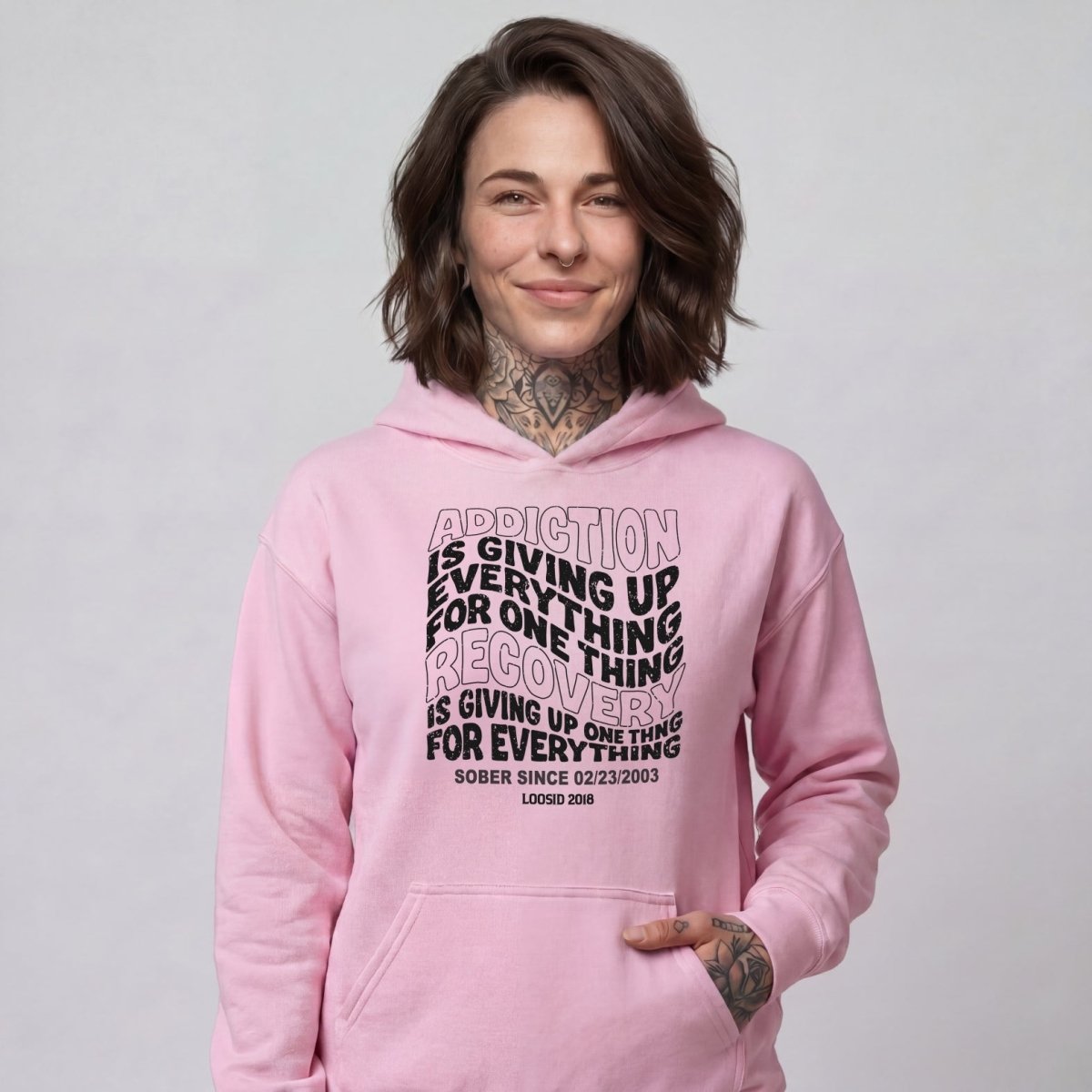 Addiction is Giving up Recovery Hoodie flat lay styled image (view 23)