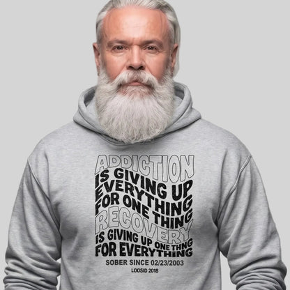 Addiction is Giving up Recovery Hoodie flat lay styled image (view 13)
