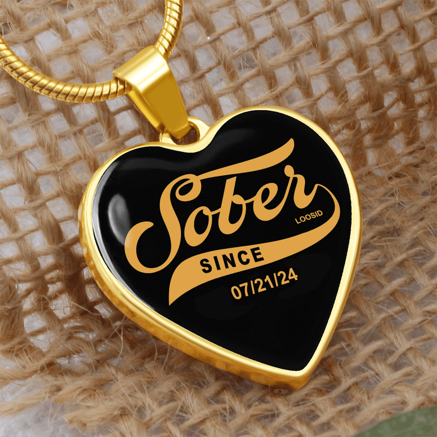Close-up of Sobriety Gift necklace with engraved sobriety milestone date
