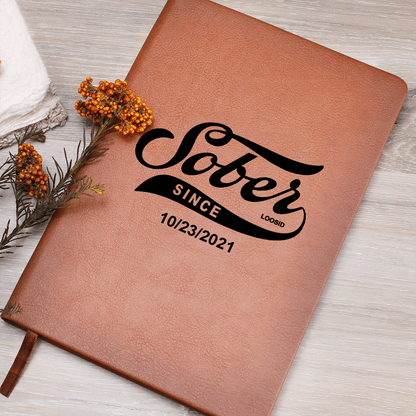 Sober Since Vegan Leather Journal with Date Sober Journal flat lay styled image (view 3)