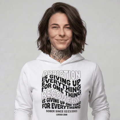 Addiction is Giving up Recovery Hoodie flat lay styled image (view 13)