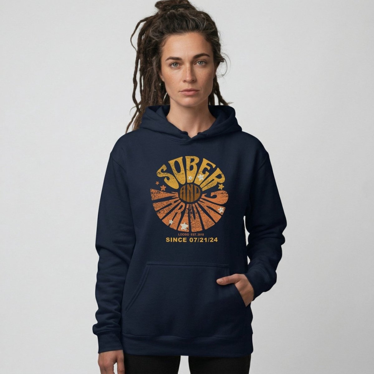 Sober & Thriving Recovery Hoodie flat lay styled image (view 13)