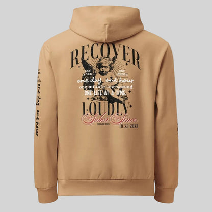 Recover Loudly Tan Recovery Hoodie Limited Edition Recovery Hoodie flat lay styled image (view 3)