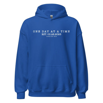 One Day At a Time Recovery Hoodie flat lay styled image (view 23)