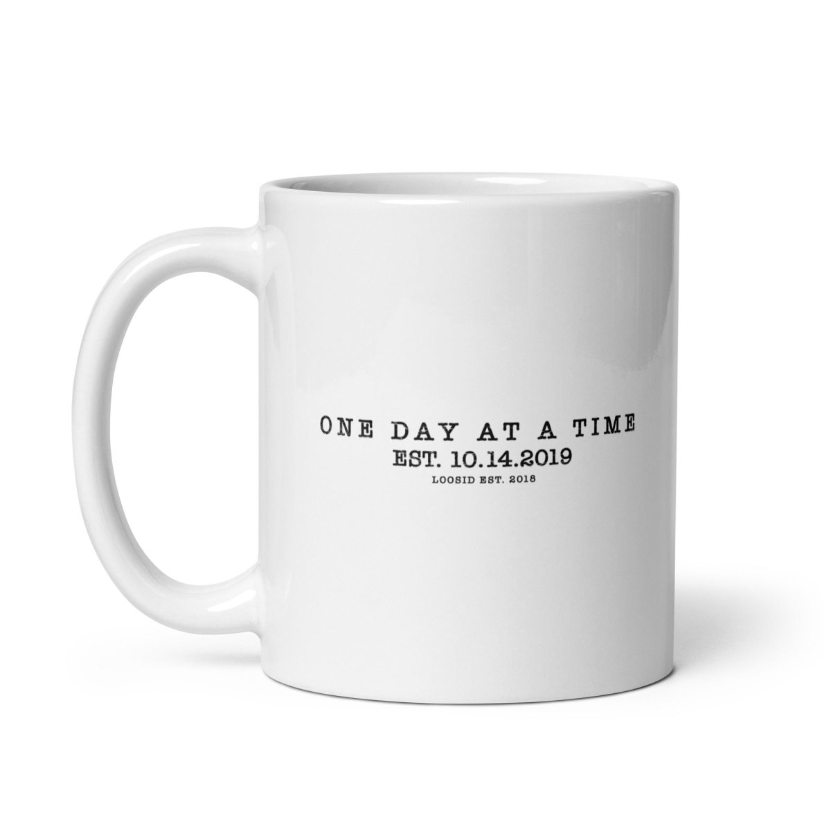 One Day at a Time glossy Sober Sober Coffee Mug flat lay styled image (view 3)