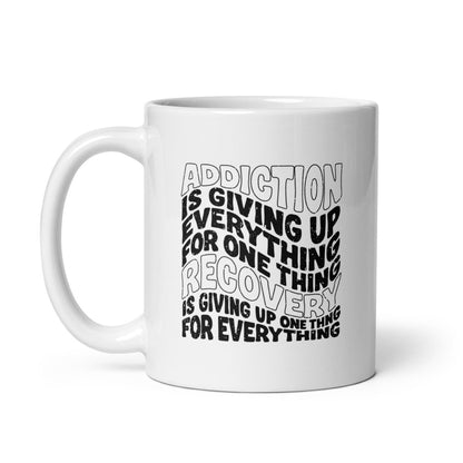Addiction is Giving Up glossy Sober Sober Coffee Mug flat lay styled image (view 3)
